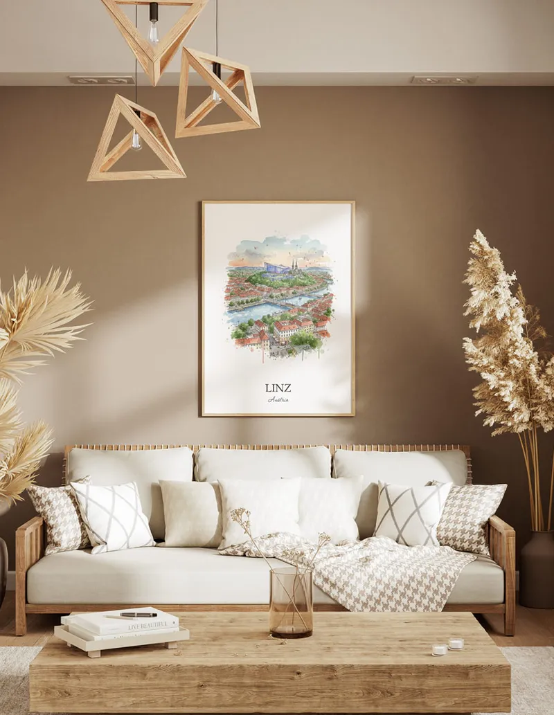 A gorgeous boho-inspired living space with a framed vintage travel poster of Linz city on display.
