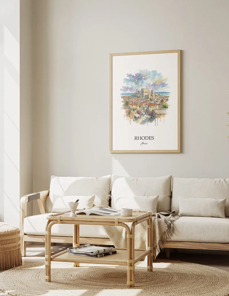 Framed wall art featuring Rhodes (City), Greece in a light wood frame hanging above a sofa in a modern living room.