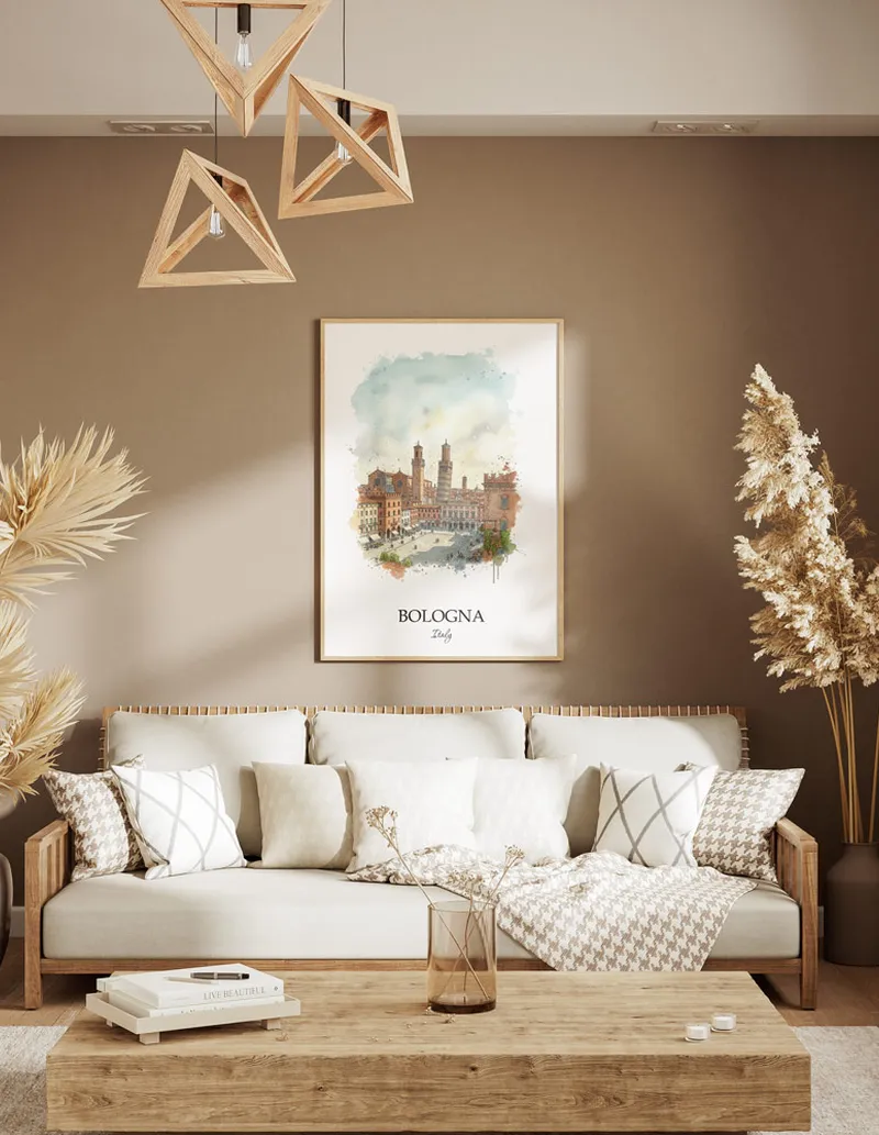 A gorgeous boho-inspired living space with a framed vintage travel poster of Bologna city on display.
