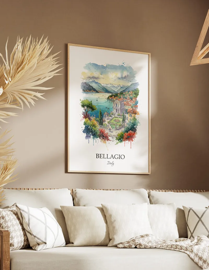 Vintage travel poster of Bellagio city, Italy in a light frame displayed above a sofa in a bright boho interior.