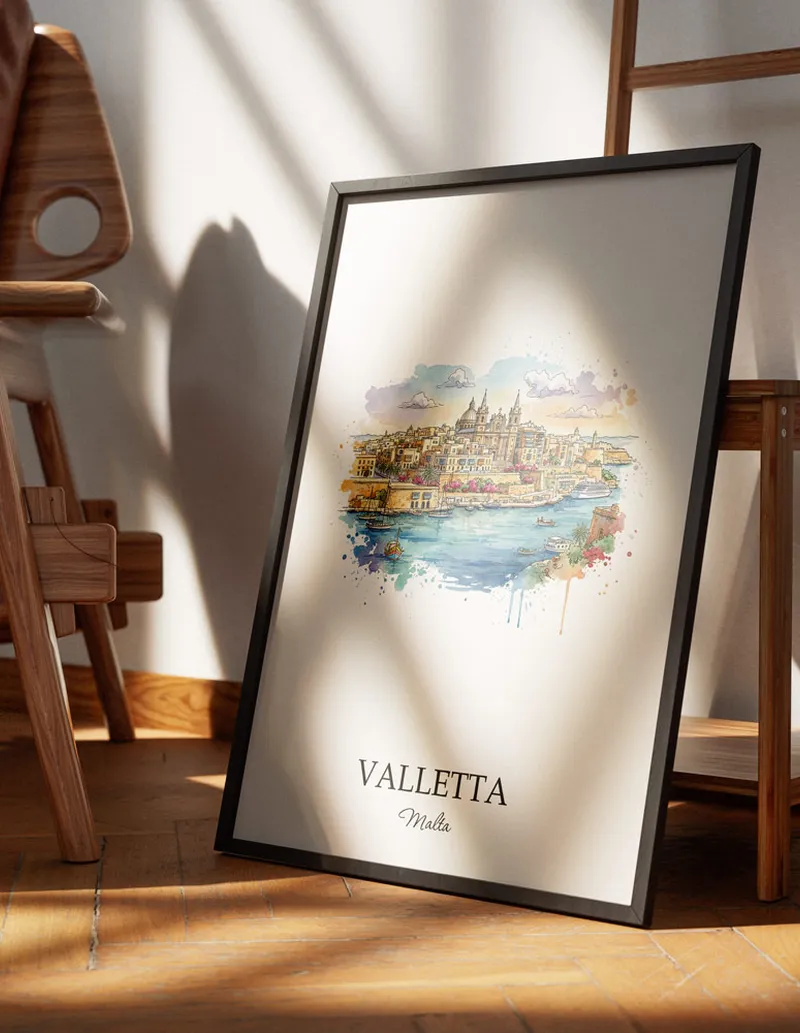 Minimalist poster of Valletta city in Malta in a light frame standing on the floor in a dark moody interior.