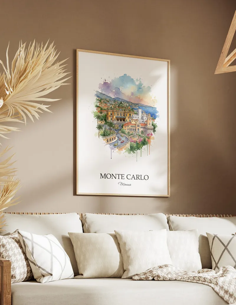 Vintage travel poster of Monte Carlo city, Monaco in a light frame displayed above a sofa in a bright boho interior.