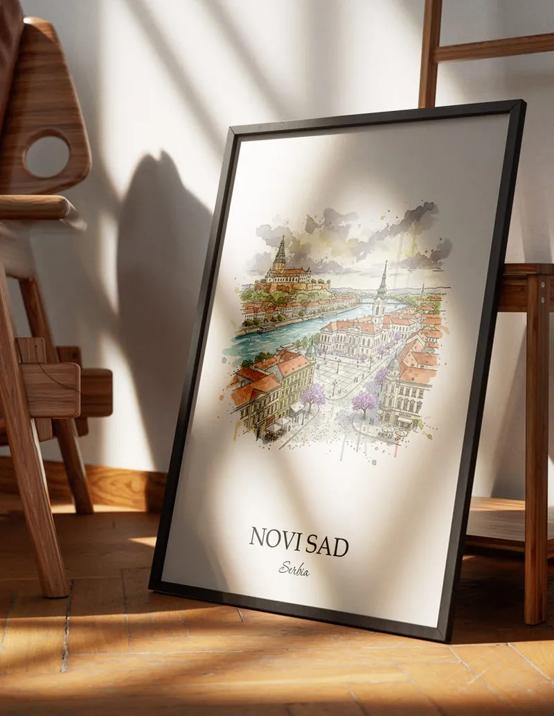 Minimalist poster of Novi Sad city in Serbia in a light frame standing on the floor in a dark moody interior.