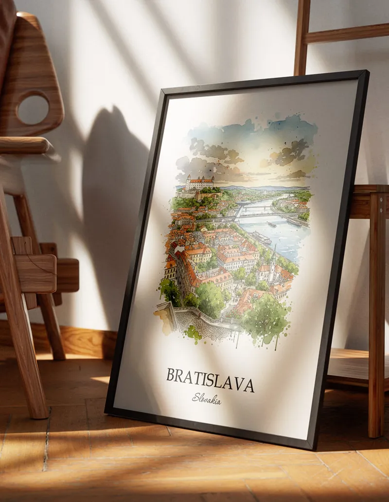 Minimalist poster of Bratislava city in Slovakia in a light frame standing on the floor in a dark moody interior.
