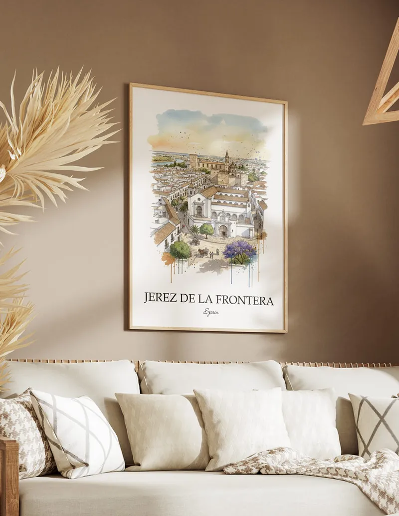 Vintage travel poster of Jerez de la Frontera city, Spain in a light frame displayed above a sofa in a bright boho interior.