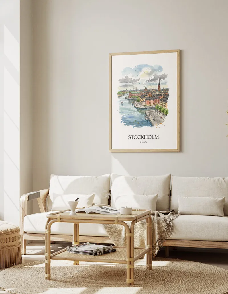 Framed wall art featuring Stockholm, Sweden in a light wood frame hanging above a sofa in a modern living room.