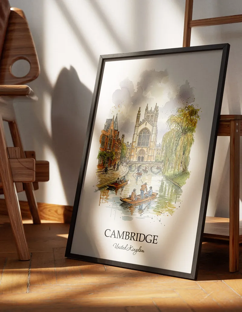 Minimalist poster of Cambridge city in United Kingdom in a light frame standing on the floor in a dark moody interior.