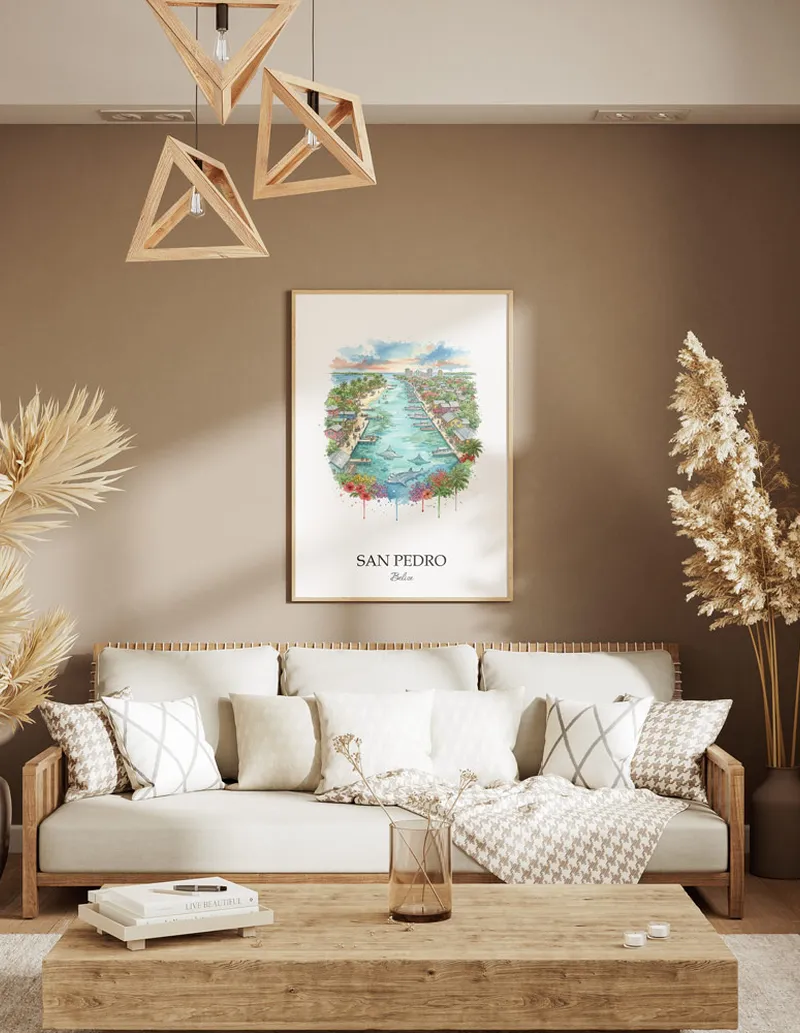 A gorgeous boho-inspired living space with a framed vintage travel poster of San Pedro city on display.
