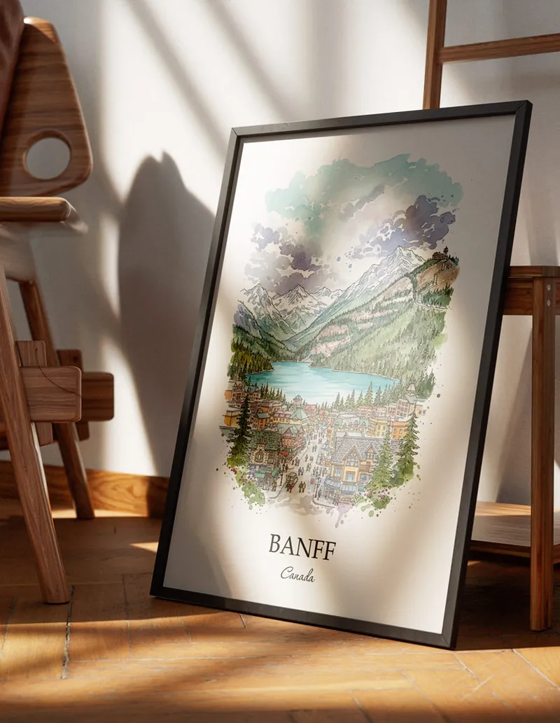 Minimalist poster of Banff city in Canada in a light frame standing on the floor in a dark moody interior.
