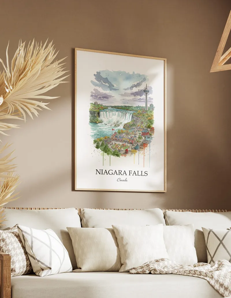 Vintage travel poster of Niagara Falls city, Canada in a light frame displayed above a sofa in a bright boho interior.