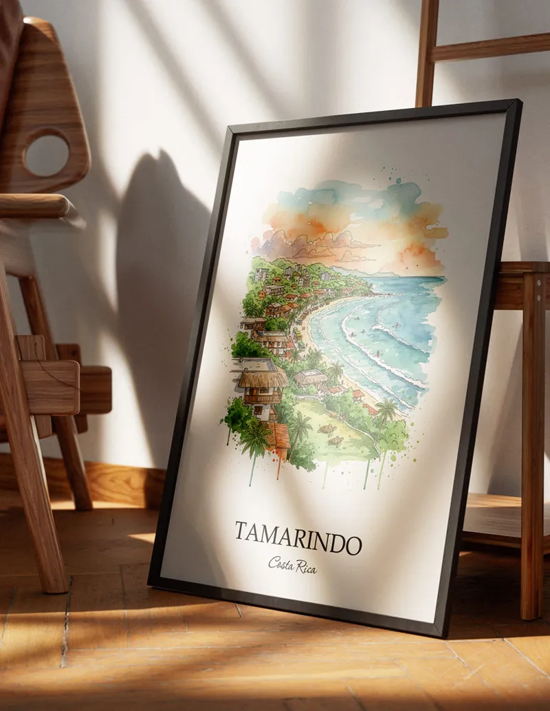Minimalist poster of Tamarindo city in Costa Rica in a light frame standing on the floor in a dark moody interior.