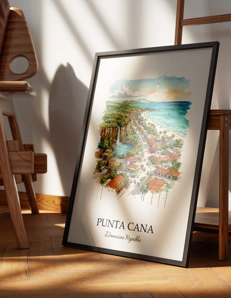 Minimalist poster of Punta Cana city in Dominican Republic in a light frame standing on the floor in a dark moody interior.