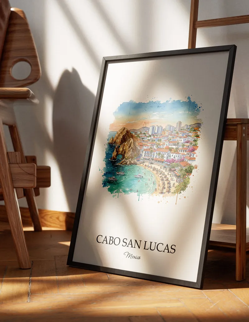 Minimalist poster of Cabo San Lucas city in Mexico in a light frame standing on the floor in a dark moody interior.