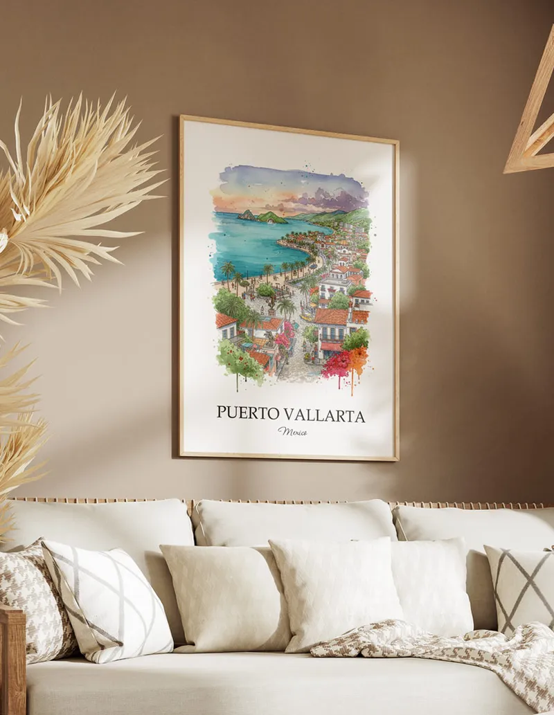 Vintage travel poster of Puerto Vallarta city, Mexico in a light frame displayed above a sofa in a bright boho interior.