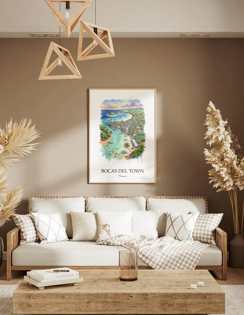 A gorgeous boho-inspired living space with a framed vintage travel poster of Bocas del Town city on display.
