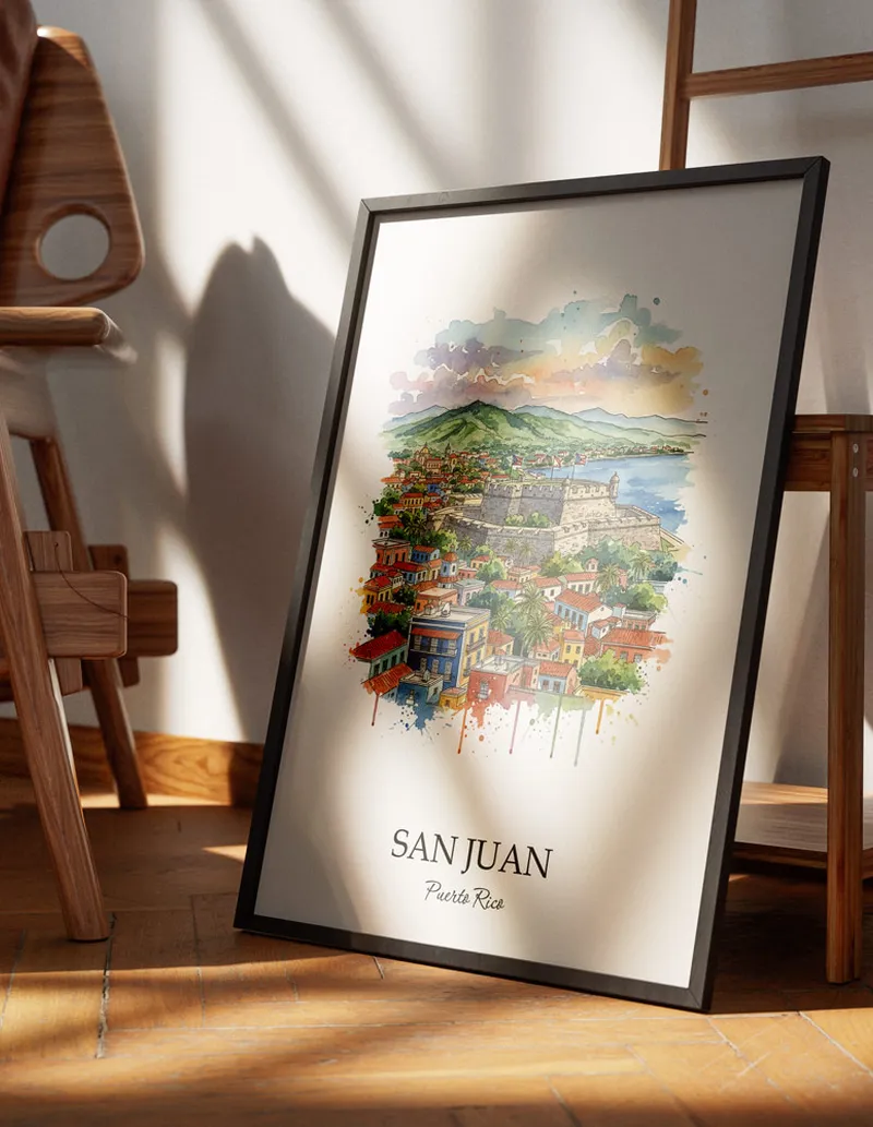 Minimalist poster of San Juan city in Puerto Rico (US Territory) in a light frame standing on the floor in a dark moody interior.