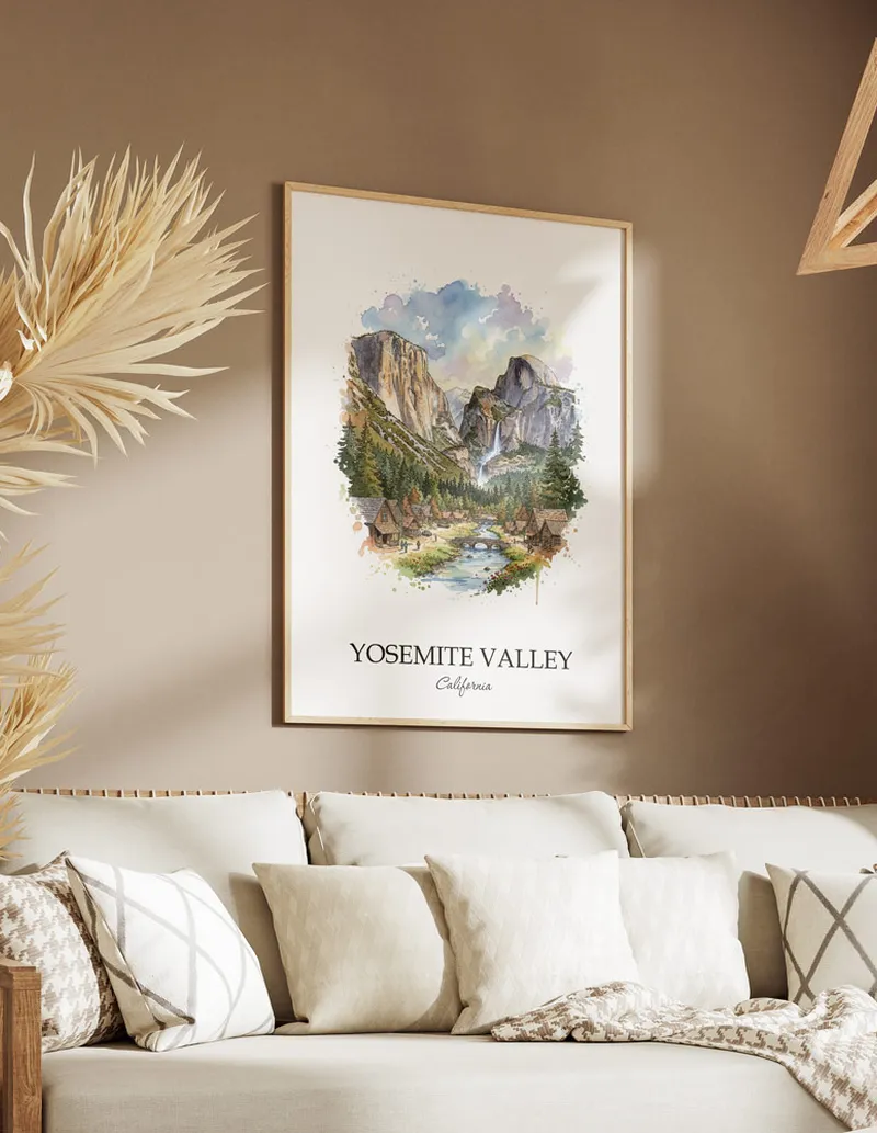 Vintage travel poster of Yosemite Valley city, USA - California in a light frame displayed above a sofa in a bright boho interior.