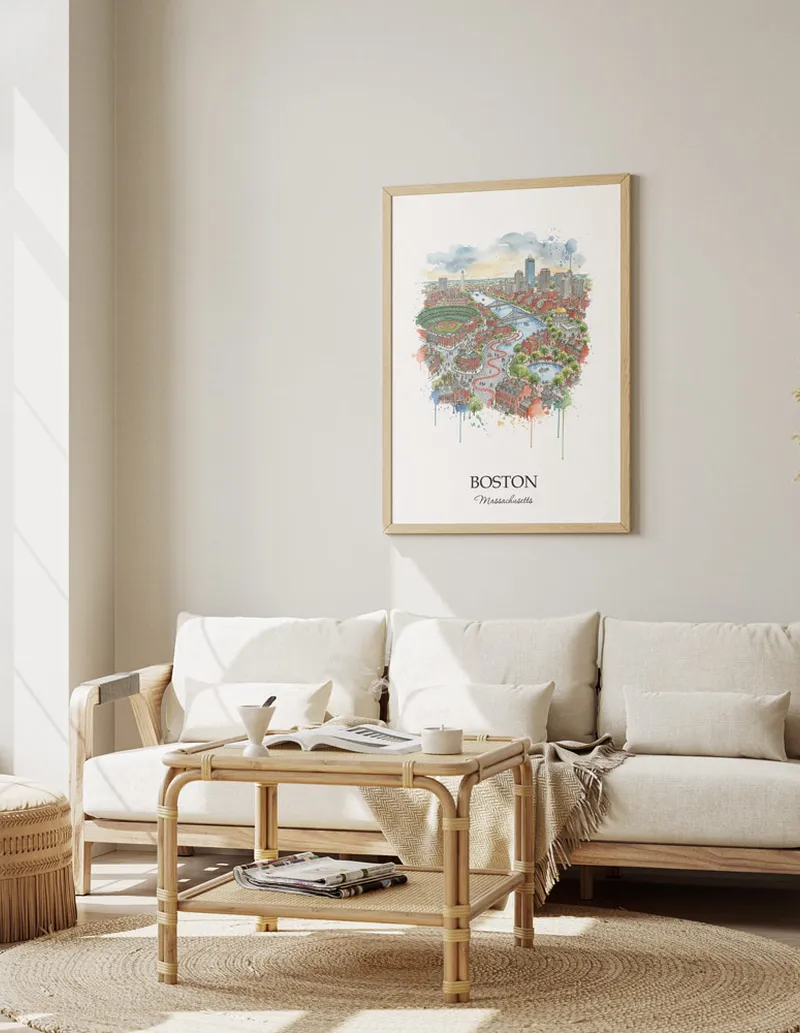 Framed wall art featuring Boston, USA - Massachusetts in a light wood frame hanging above a sofa in a modern living room.