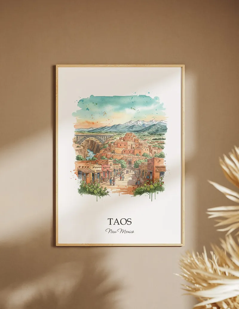A clean and modern mockup showing a framed Taos city print on a minimalist background.