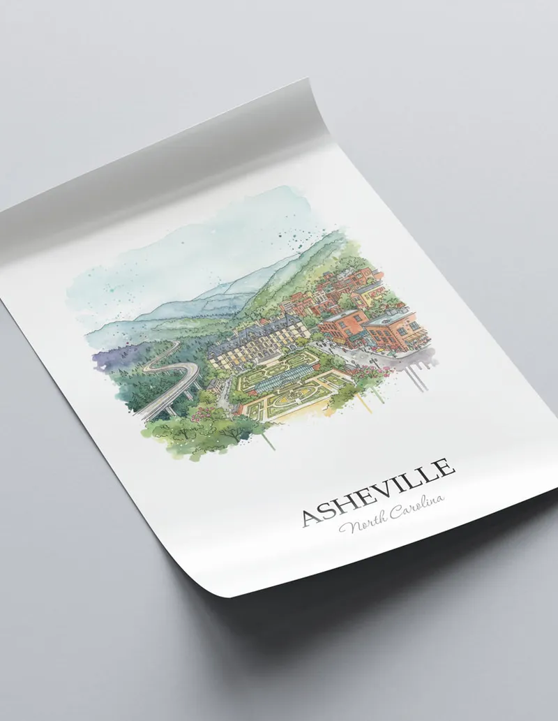A close-up of a high-quality paper print featuring the Asheville city minimalist design.