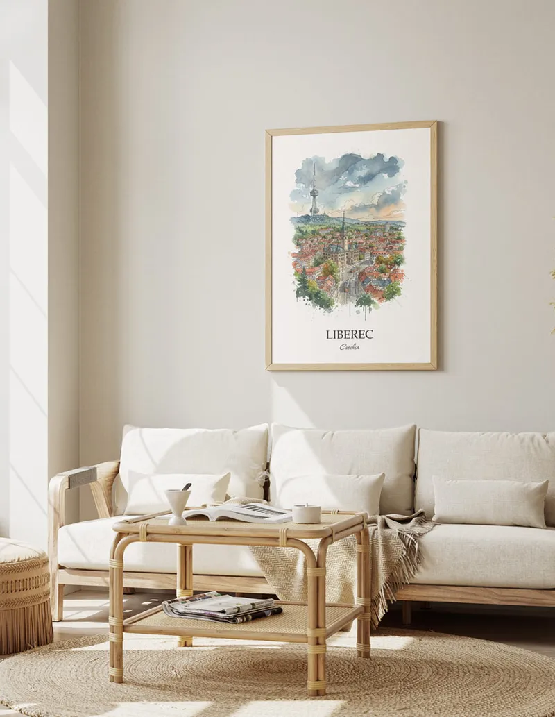 Framed wall art featuring Liberec, Czechia in a light wood frame hanging above a sofa in a modern living room.
