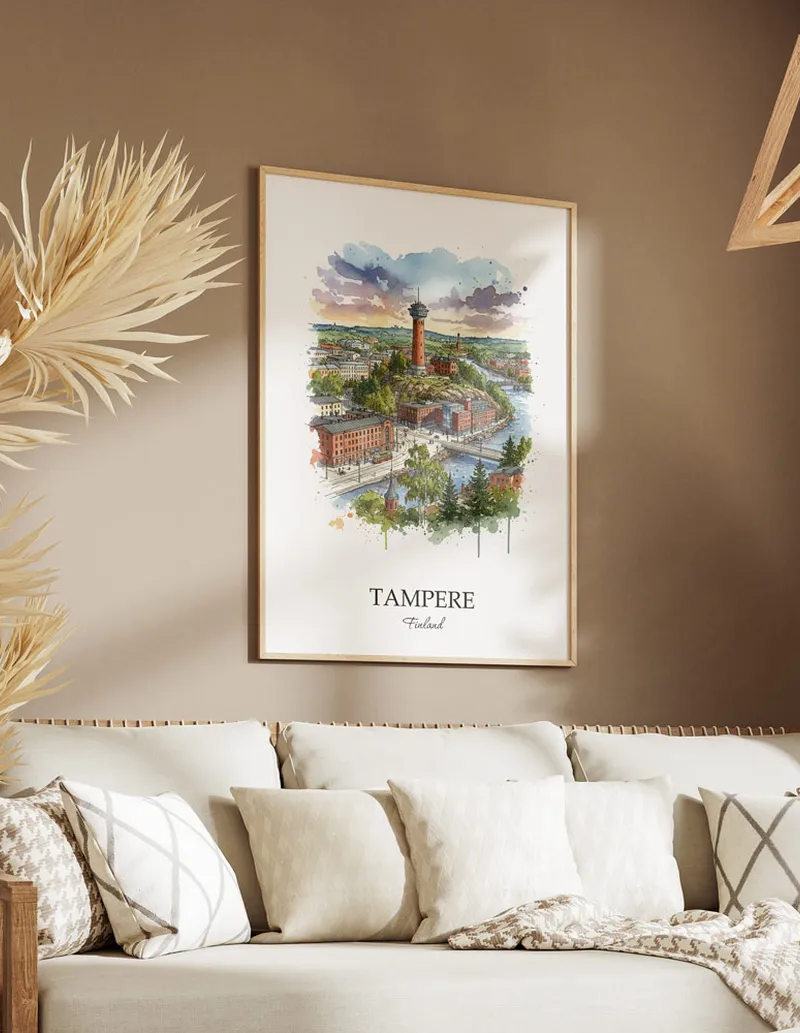 Vintage travel poster of Tampere city, Finland in a light frame displayed above a sofa in a bright boho interior.