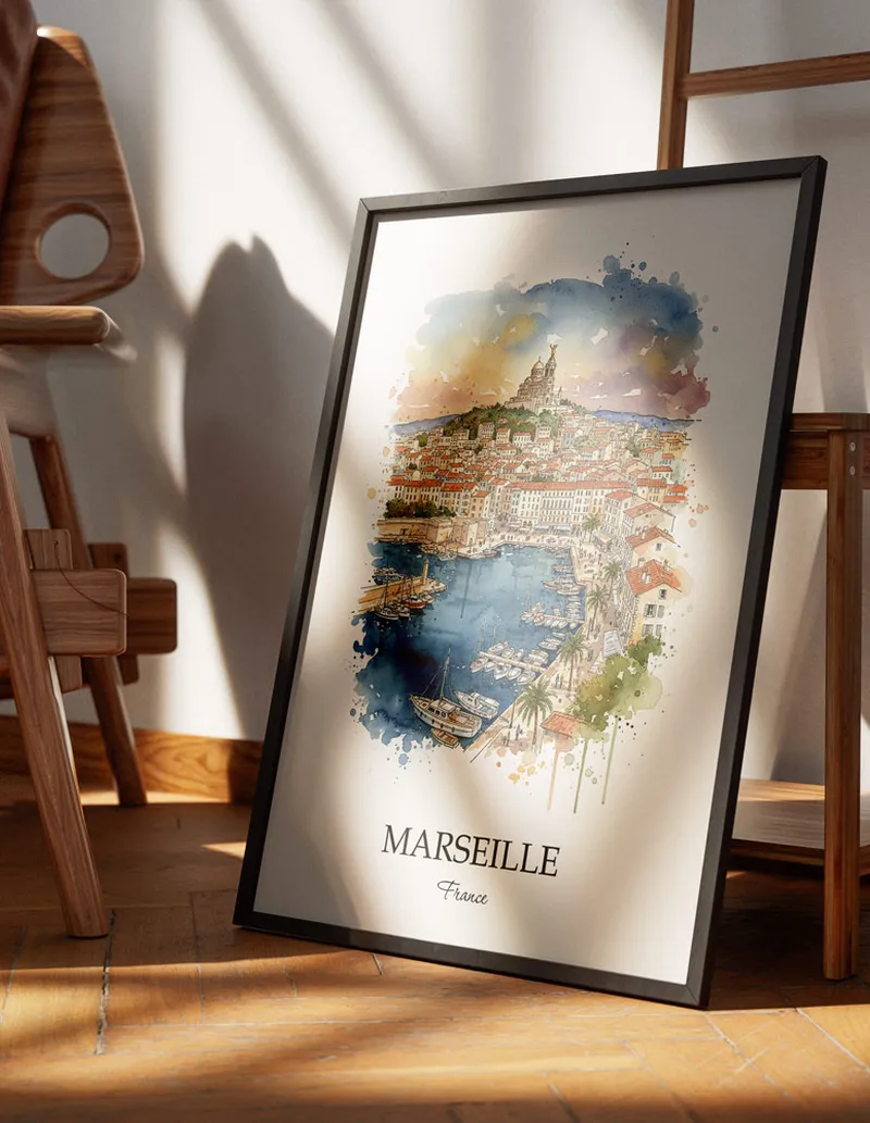 Minimalist poster of Marseille city in France in a light frame standing on the floor in a dark moody interior.