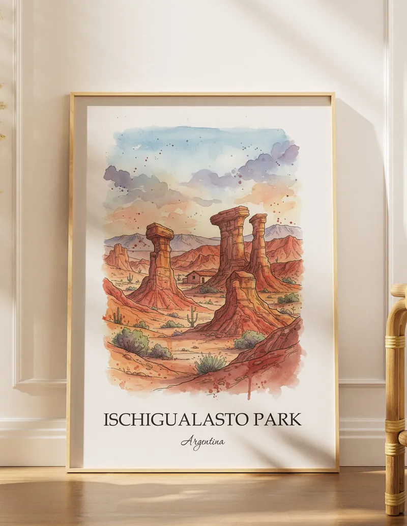 Framed wall art featuring Ischigualasto Park in Argentina in a light wood frame leaning on the floor.