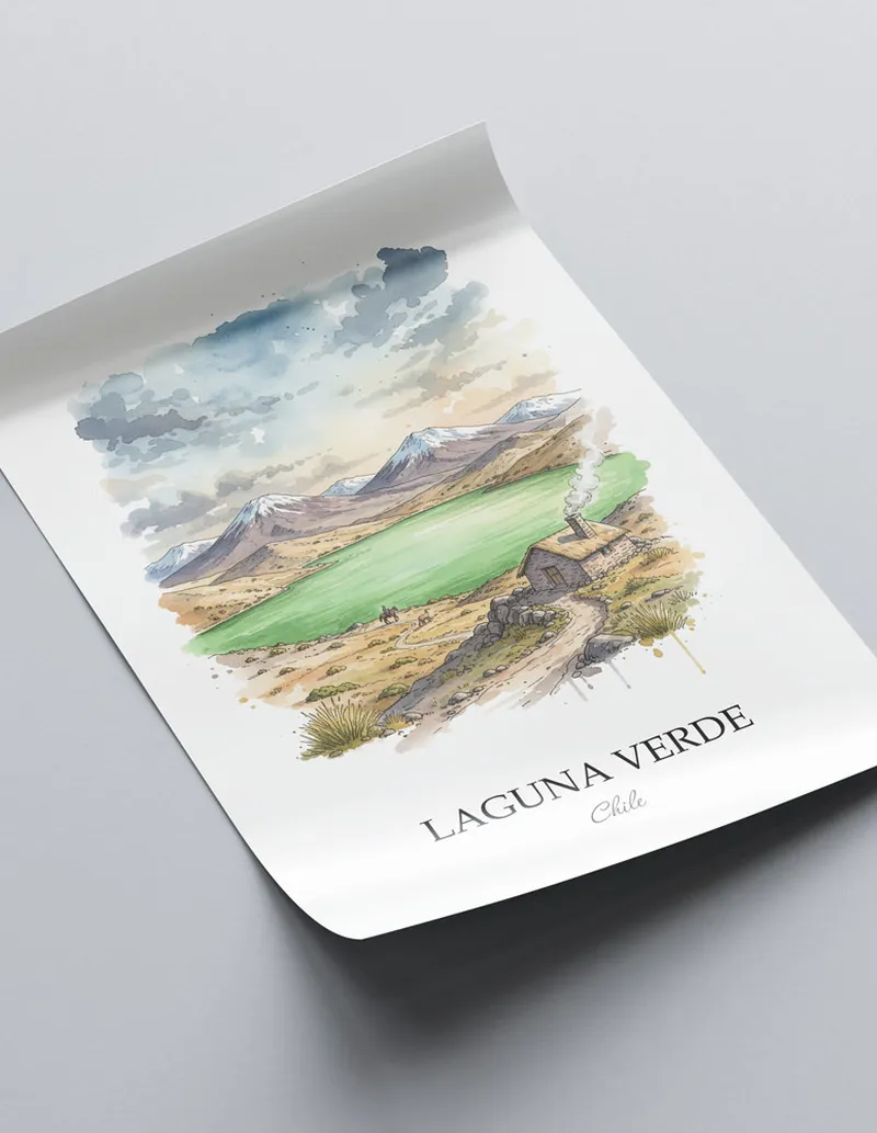 Framed wall art featuring Laguna Verde in Chile in a light wood frame leaning on the floor.