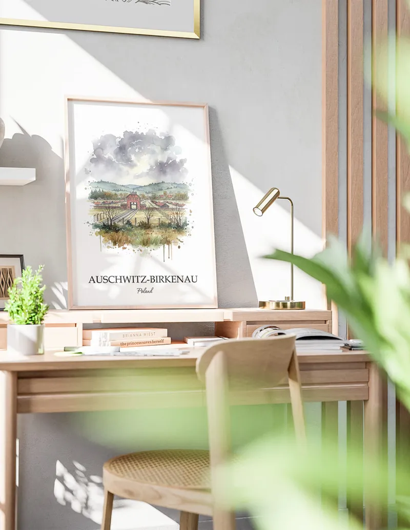 A gorgeous boho-inspired living space with a framed vintage travel poster of Auschwitz-Birkenau in Poland on display.