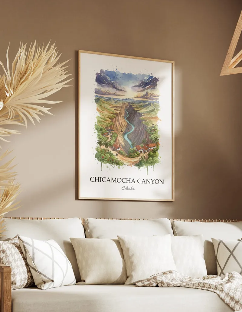 A gorgeous boho-inspired living space with a framed vintage travel poster of Chicamocha Canyon in Colombia on display.