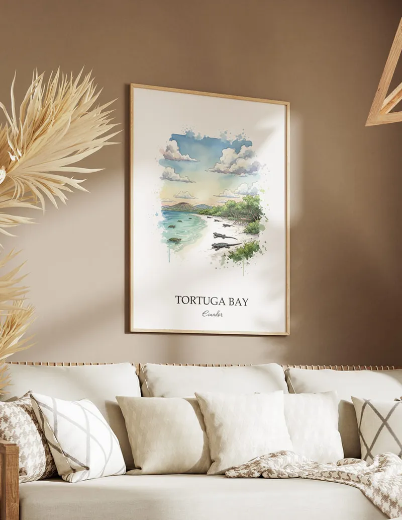 A gorgeous boho-inspired living space with a framed vintage travel poster of Tortuga Bay in Ecuador on display.