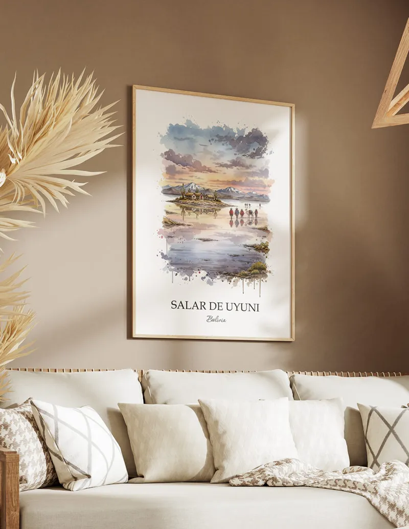 A gorgeous boho-inspired living space with a framed vintage travel poster of Salar de Uyuni in Bolivia on display.