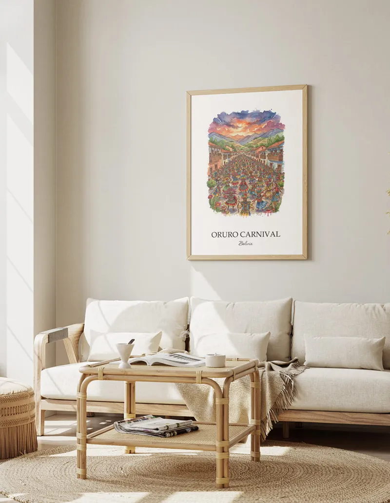 Vintage travel poster of Oruro Carnival, Bolivia in a light frame displayed above a sofa in a bright boho interior.
