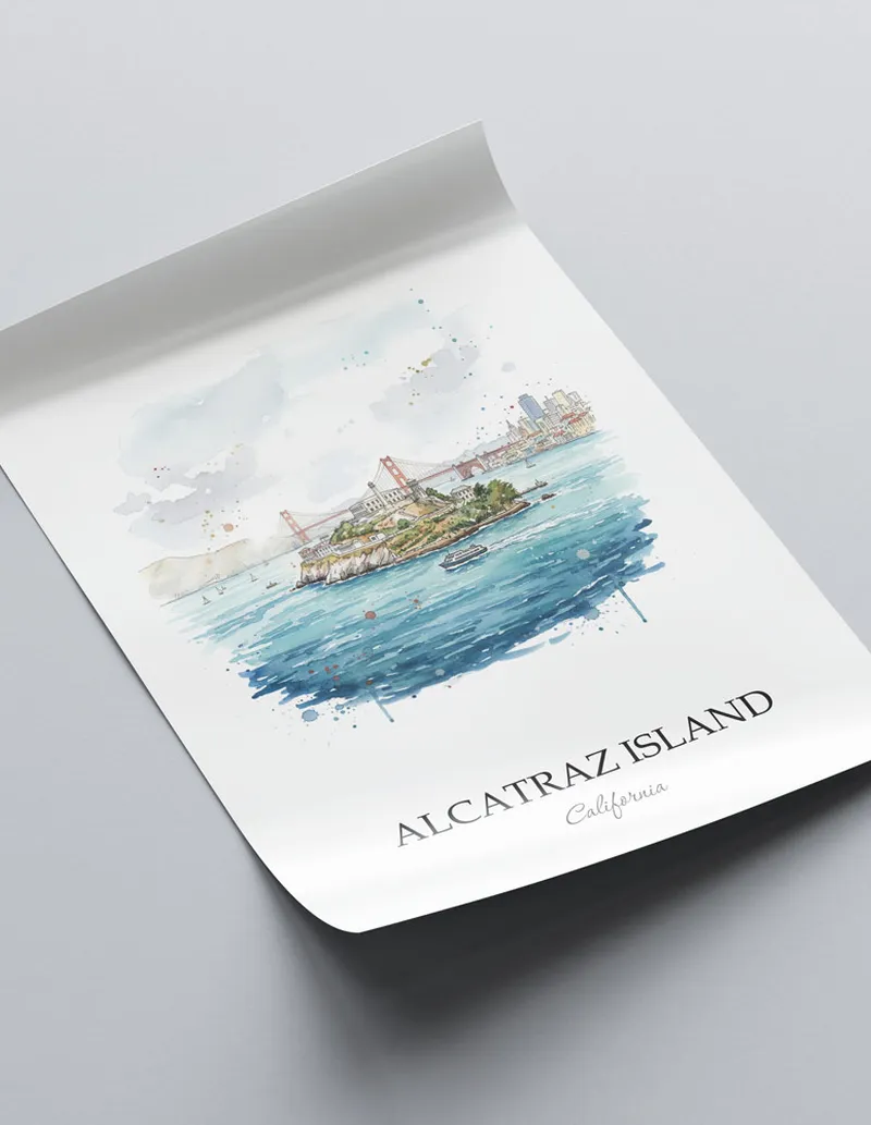 Framed wall art featuring Alcatraz Island in California in a light wood frame leaning on the floor.