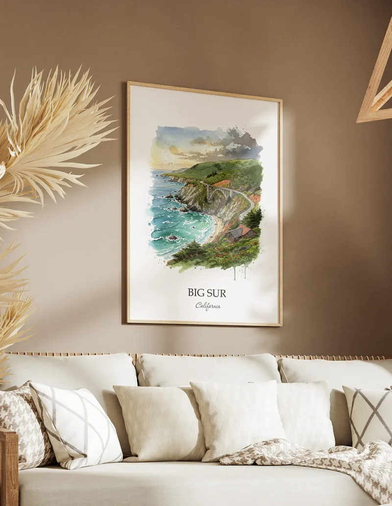 A gorgeous boho-inspired living space with a framed vintage travel poster of Big Sur in California on display.
