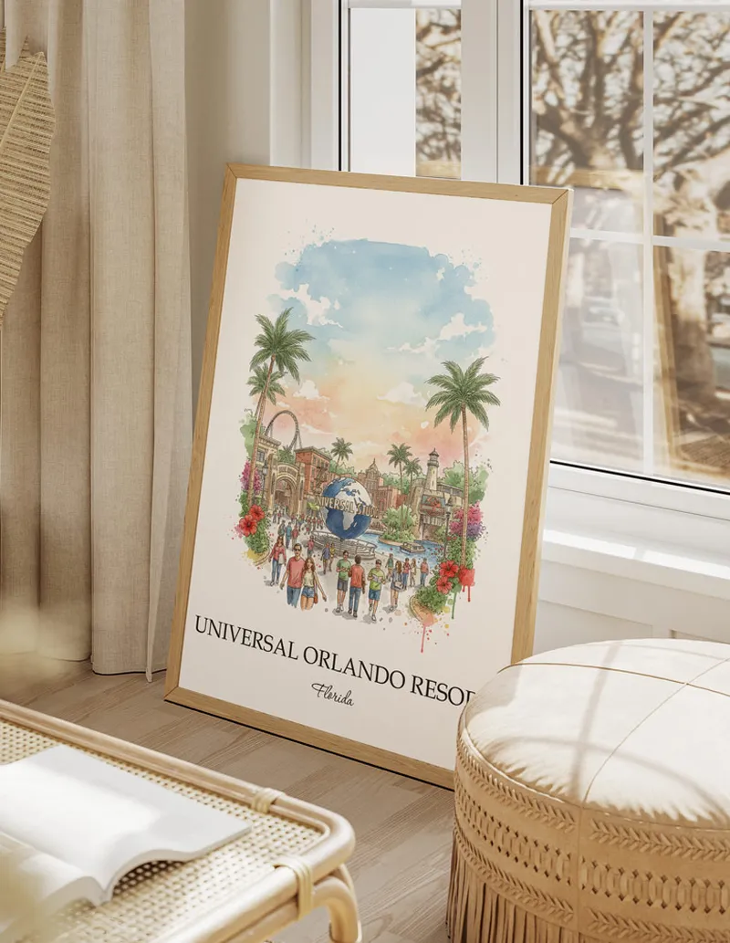 Framed wall art featuring Universal Orlando Resort, Florida in a light wood frame hanging above a sofa in a modern living room.
