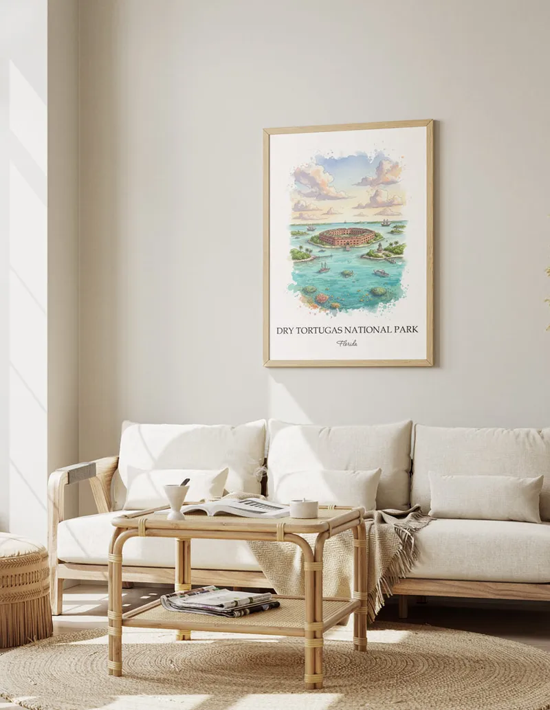Vintage travel poster of Dry Tortugas National Park, Florida in a light frame displayed above a sofa in a bright boho interior.