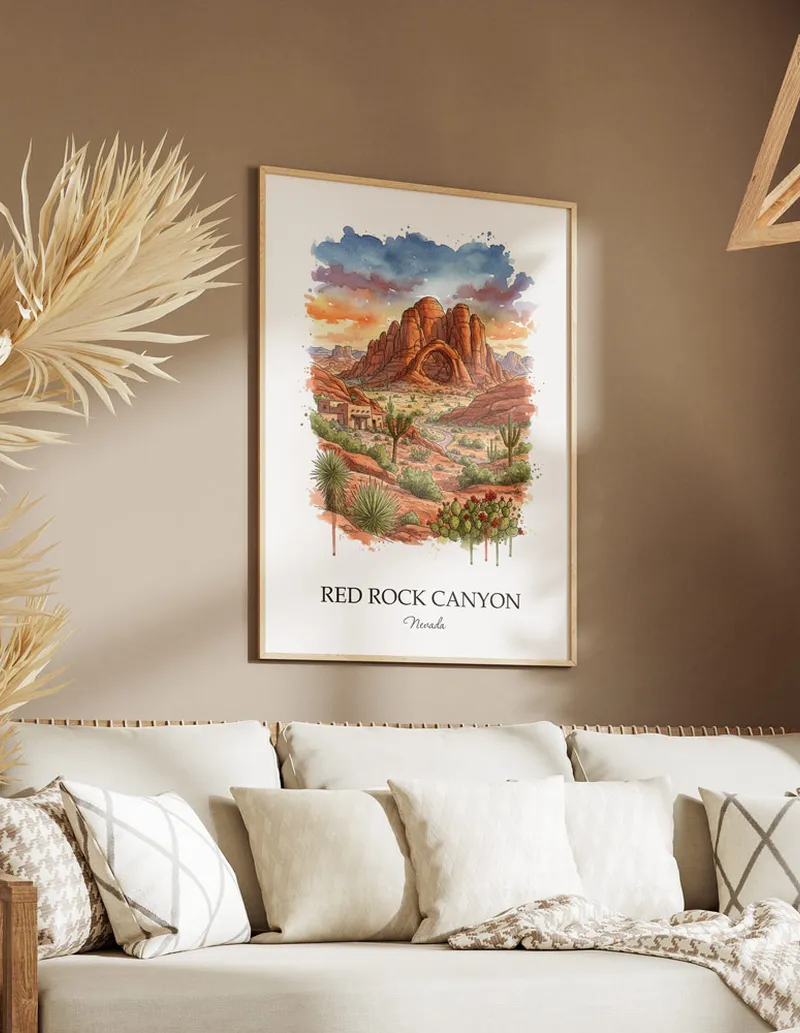 A gorgeous boho-inspired living space with a framed vintage travel poster of Red Rock Canyon in Nevada on display.