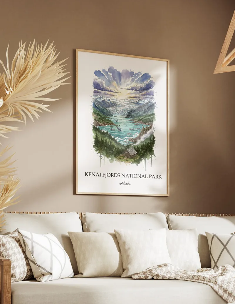 Cozy, well-lit workspace with a minimalist poster of Kenai Fjords National Park, Alaska in a light frame sitting on the desk.