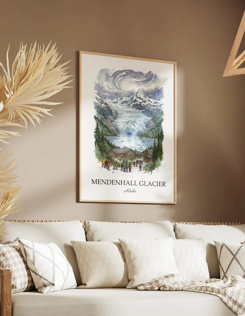 Cozy, well-lit workspace with a minimalist poster of Mendenhall Glacier, Alaska in a light frame sitting on the desk.