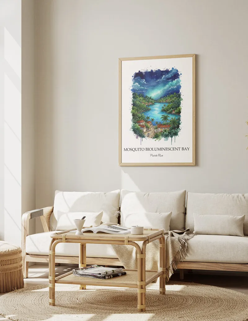 A gorgeous boho-inspired living space with a framed vintage travel poster of Mosquito Bioluminescent Bay in Puerto Rico on display.