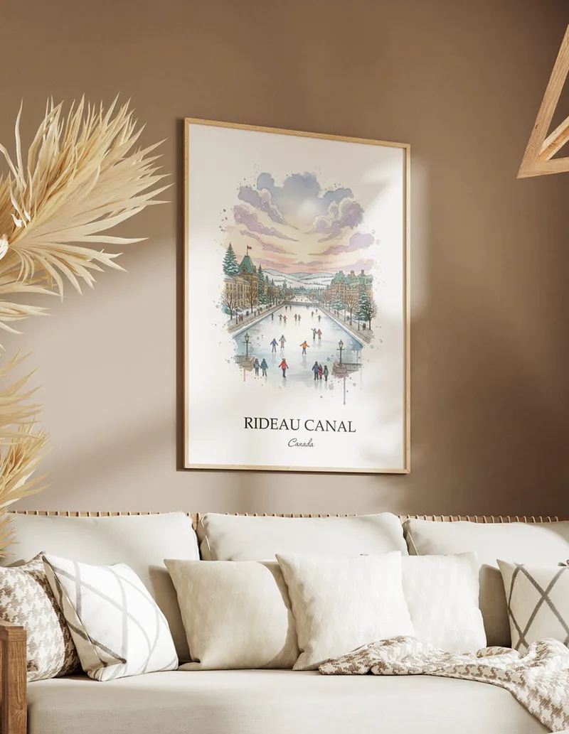Cozy, well-lit workspace with a minimalist poster of Rideau Canal, Canada in a light frame sitting on the desk.