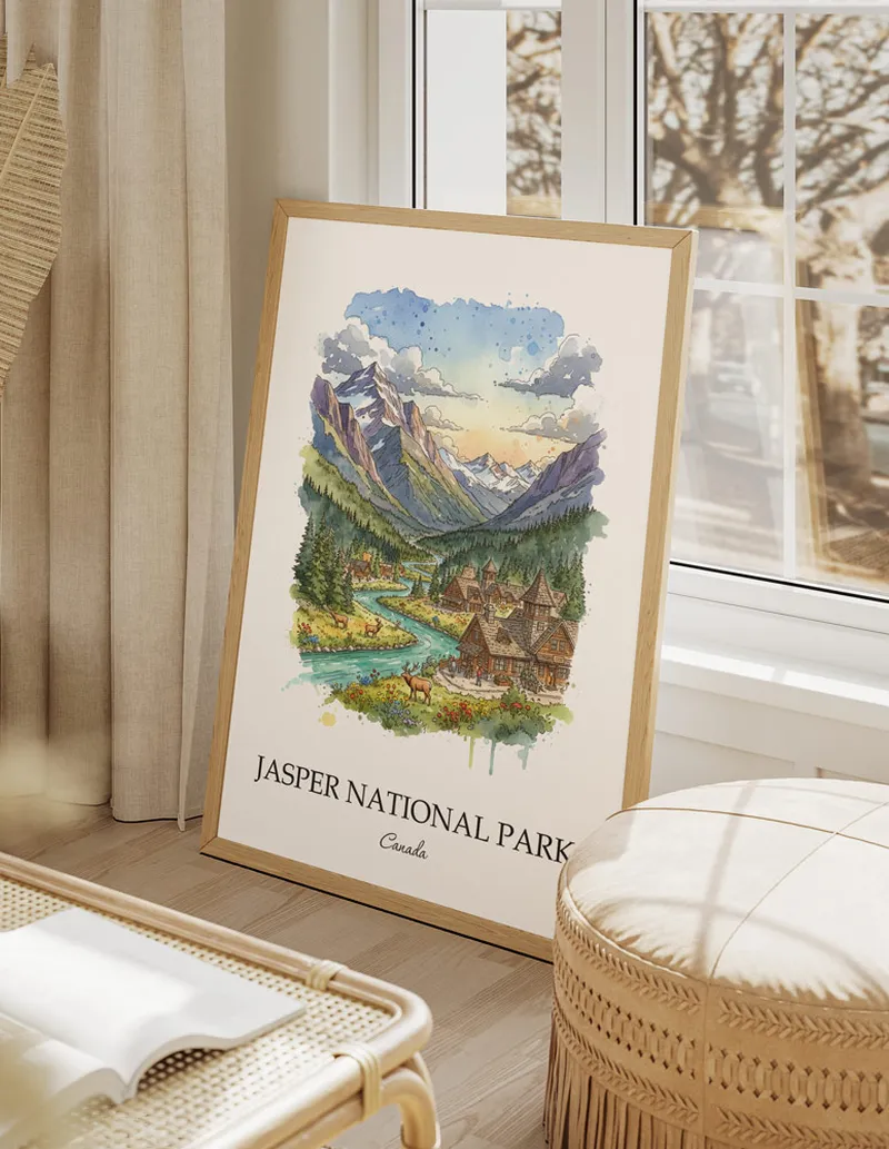 Vintage travel poster of Jasper National Park, Canada in a light frame displayed above a sofa in a bright boho interior.