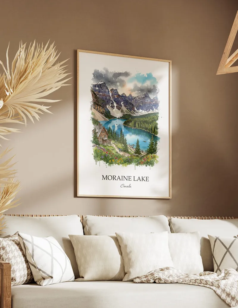Cozy, well-lit workspace with a minimalist poster of Moraine Lake, Canada in a light frame sitting on the desk.