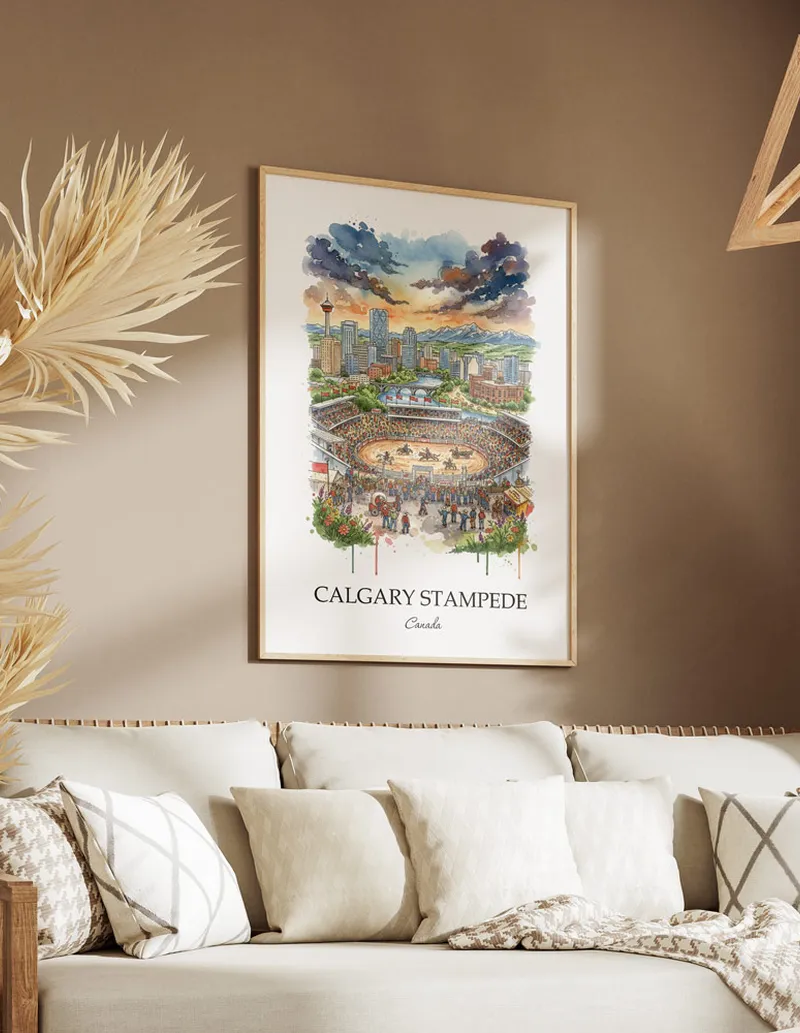 Cozy, well-lit workspace with a minimalist poster of Calgary Stampede, Canada in a light frame sitting on the desk.