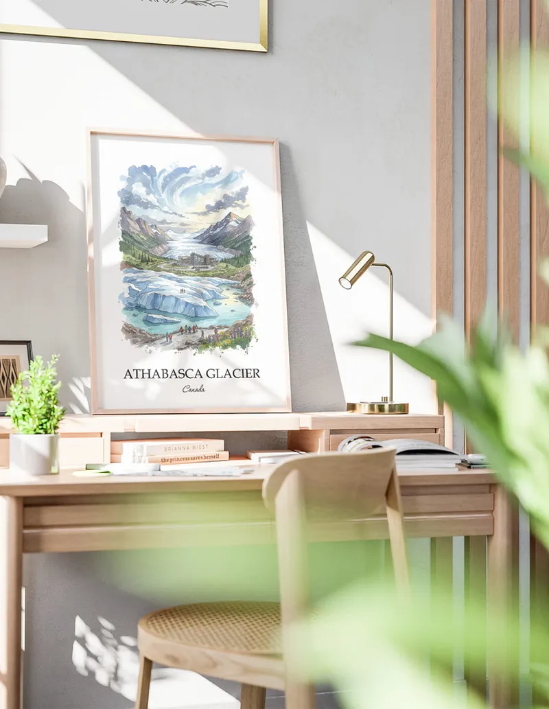 Framed wall art featuring Athabasca Glacier in Canada in a light wood frame leaning on the floor.