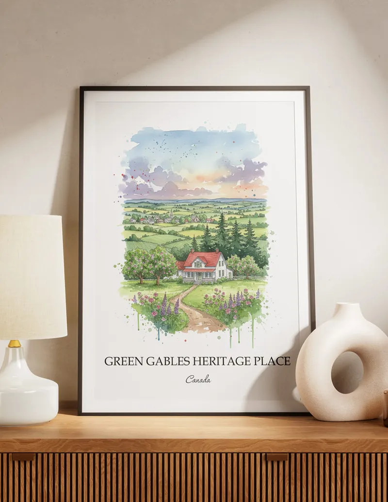 Vintage travel poster of Green Gables Heritage Place, Canada in a light frame displayed above a sofa in a bright boho interior.