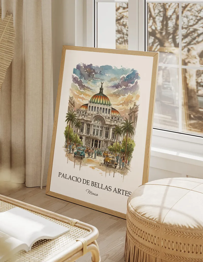 A gorgeous boho-inspired living space with a framed vintage travel poster of Palacio de Bellas Artes in Mexico on display.