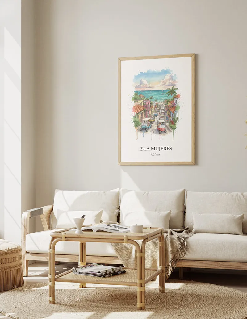Cozy, well-lit workspace with a minimalist poster of Isla Mujeres, Mexico in a light frame sitting on the desk.
